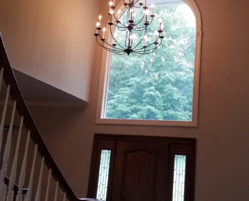 This is a photo of the inside of one of our client's home. This is the final result of a chandelier lighting installation done by our electricians in Ridgefield, Connecticut.